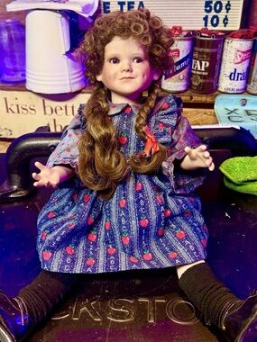Elke Hutchins 1988 Porcelain Girl Doll in Blue Apple Print Dress with signature